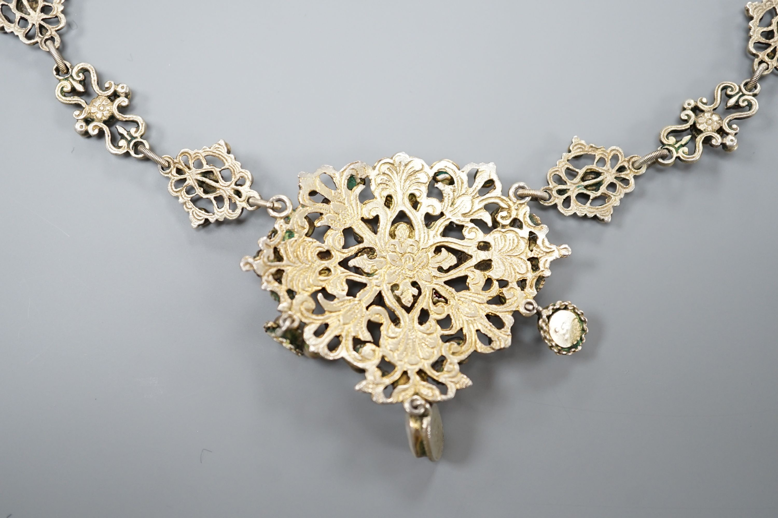An ornate 19th century Austro-Hungarian gilt white metal, baroque pearl, paste and gem set drop necklace, 46cm, maker's mark WH or WM.